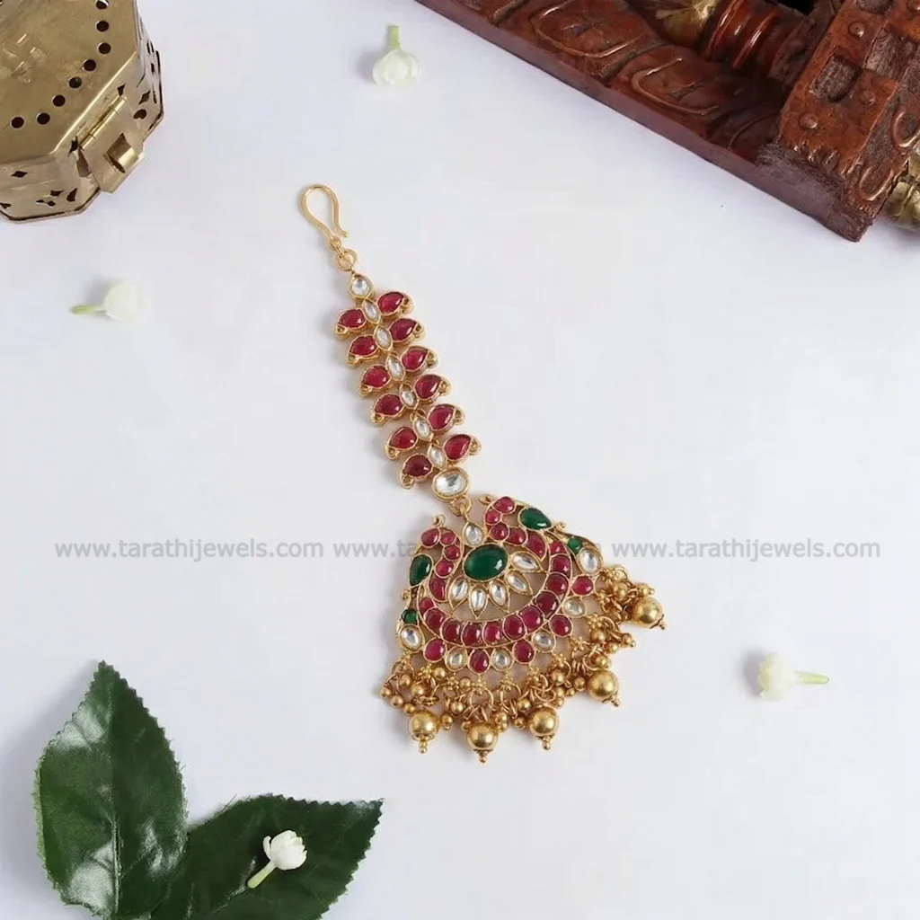 Gold drops Peacock design Tikka T125